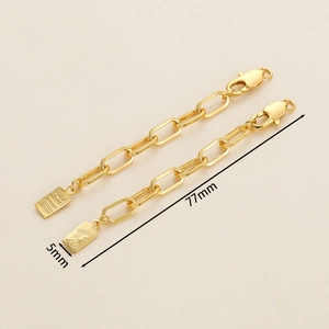 Detail of 18K gold plated extension chains with Queen and Fine Gold pendants, 77mm length