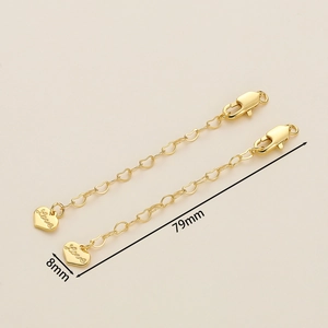 Detail view of gold-plated heart-shaped extension chains with Love pendants and lobster clasps