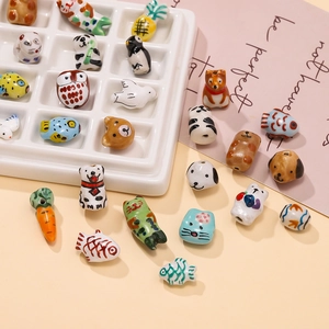 Handmade ceramic animal beads including panda cat and fish for DIY jewelry making