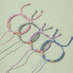 Handmade woven peach knot bracelets in four Morandi colors with adjustable cords