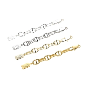 Set of 18K gold and silver plated anchor chain bracelets with royal relief pendant