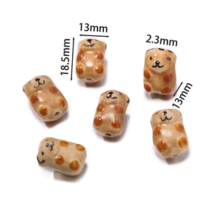 Detail view of 18.5x13mm brown ceramic bear beads for DIY handmade jewelry crafts