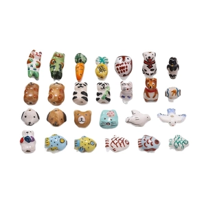 Assorted handmade ceramic beads with animal and fruit shapes for DIY jewelry making