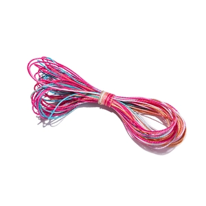 Close-up of 1mm multi-colored polyester waxed cords for DIY jewelry weaving