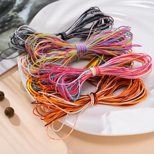 Macro detail of colorful 1mm polyester waxed cords for DIY handmade jewelry weaving