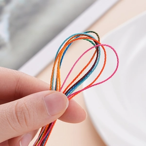 Close-up of 1mm colorful polyester wax cords for DIY handmade jewelry weaving and beading