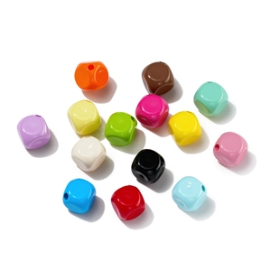 Macro shot of colorful 10mm faceted acrylic cube beads for DIY necklace jewelry making