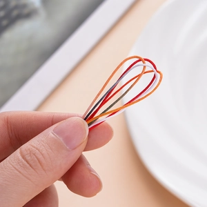 Macro-opname van 72# nylon verloopkoord in rood en oranje voor DIY-sieradenweven