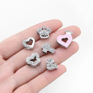6-piece set of silver alloy charms with rhinestones featuring crown, heart and butterfly