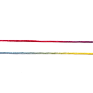 Macro shot of colorful gradient nylon cords for DIY jewelry weaving and beading