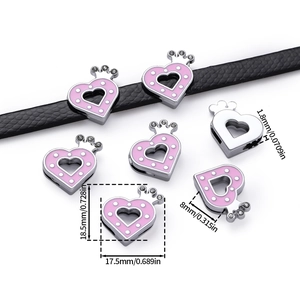 Detailed view of pink heart crown slide charms for DIY bracelets with size specifications