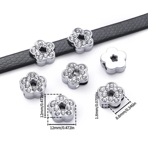 Macro view of crystal flower slider bead showing detailed 12mm size and fit on leather strap
