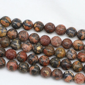 Macro view of polished natural banded agate loose beads for DIY jewelry making