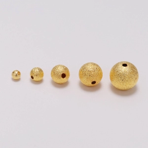 Perle rotonde dorate satinate in cinque misure per la creazione di gioielli e bracciali
