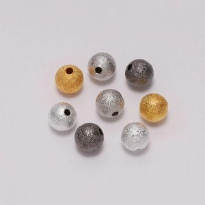 Dettaglio di 8 perle tonde opache in oro e argento per la creazione di gioielli