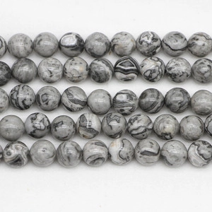 Macro shot of natural map jasper loose round beads for DIY bracelet jewelry making