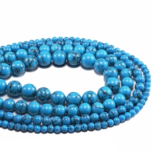Blue turquoise round beads with black matrix patterns in various sizes for jewelry making