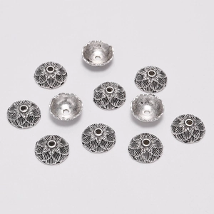 Vintage silver lotus flower bead caps for DIY jewelry making with embossed petal details