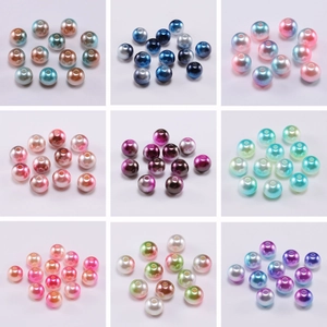 Macro view of gradient ABS pearl beads with smooth finish for DIY jewelry making