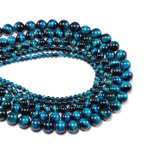Perle rotonde in occhio di tigre blu naturale con effetto gatteggiamento per gioielli