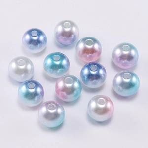 Detailed macro view of multi-color gradient ABS imitation pearls for DIY jewelry making