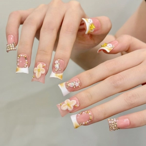 French style press-on nails with 3D floral relief, rhinestones and pearls on long square tips