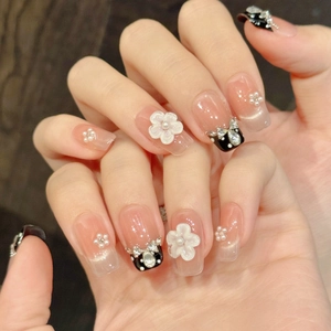 Handmade press-on nails with 3D white shells flowers, pearls and diamond bows accents