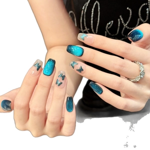 Sparkling dark blue cat eye press-on nails with butterfly design and rectangular shape