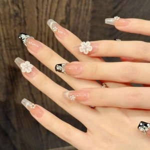Handmade press-on nails with cat eye finish, 3D white flowers, and pearl accents