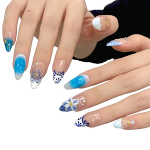 Blue and white gradient almond press-on nails with 3D embossed flowers and pearls