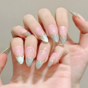 French gradient cat-eye press-on nails in matcha green and silver with golden line accents
