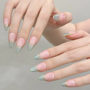 French tip almond press-on nails in matcha green and soft pink with gold line accents