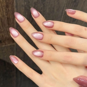 Pink purple cat eye oval press-on nails with shimmering magnetic glitter effect