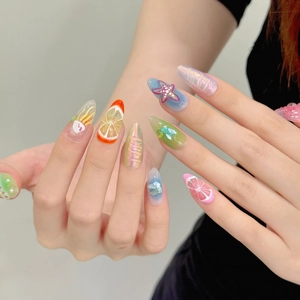 Summer beach almond press-on nails with 3D fruit designs and ocean starfish charms
