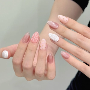 Pink cat eye press-on nails set with 3D floral carvings and golden beads