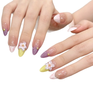 Almond-shaped purple gradient press-on nails with 3D floral, pearl, and shell accents