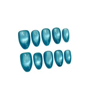 Set of 10 almond-shaped deep lake blue cat-eye nails with shimmering magnetic gloss effect