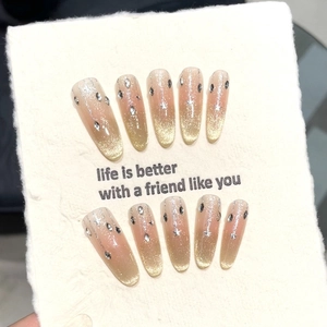Sparkling gradient cat eye press-on nails with star sequins and teardrop rhinestones