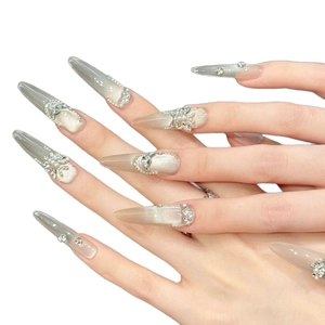 Luxurious long stiletto press-on nails with grey cat eye gradient and pearl accents