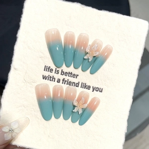 3D mint green gradient press-on nails with ice flower accents and crystal details