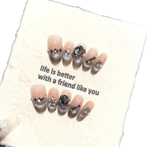 Cat eye press-on nails with silver glitter and rhinestone star charms in 10pcs set