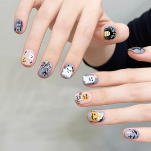 Halloween theme press-on nails with pumpkin, ghost and spider web designs in short square shape