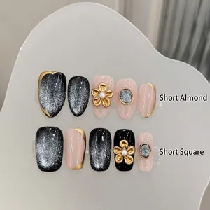 Short almond bronze cat-eye press-on nails with 3D metal flowers and pearls
