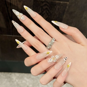 Long leopard print and floral press-on nails set with 3D flower and gold star accents