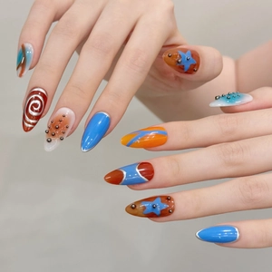 Cyberpunk metallic almond press-on nails with Y2K patterns and metal bead accents