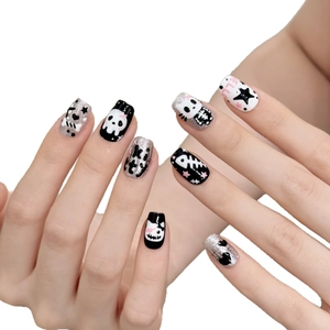 Gothic punk press-on nails featuring hand-painted cats, skulls, and silver glitter motifs