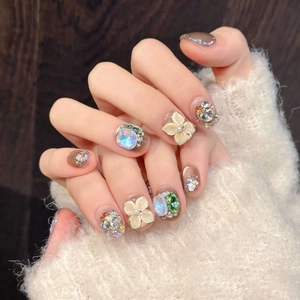 Ice crystal 3D flower cat eye press-on nails with diamonds and glitter details