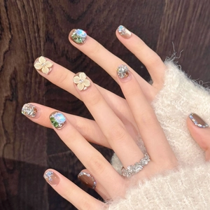 Exquisite 3D floral press-on nails with sparkling rhinestones and glitter in earthy tones