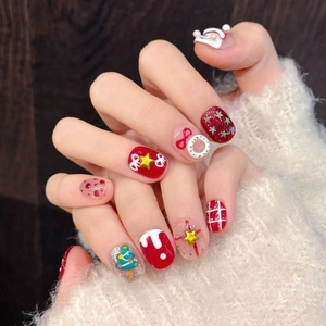 3D Christmas snowman press-on nails featuring red and green festive hand-painted art