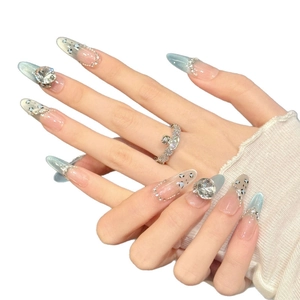 Handmade almond press-on nails with blue gradient, crystal rhinestones and dot art patterns
